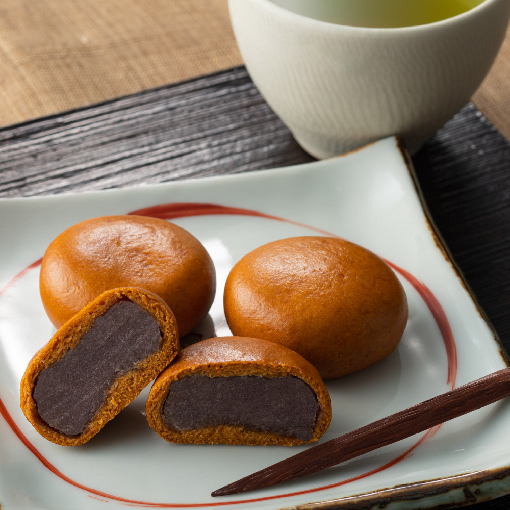 なぜ茶色い？温泉まんじゅう発祥の真相と名店比較・保存の極意