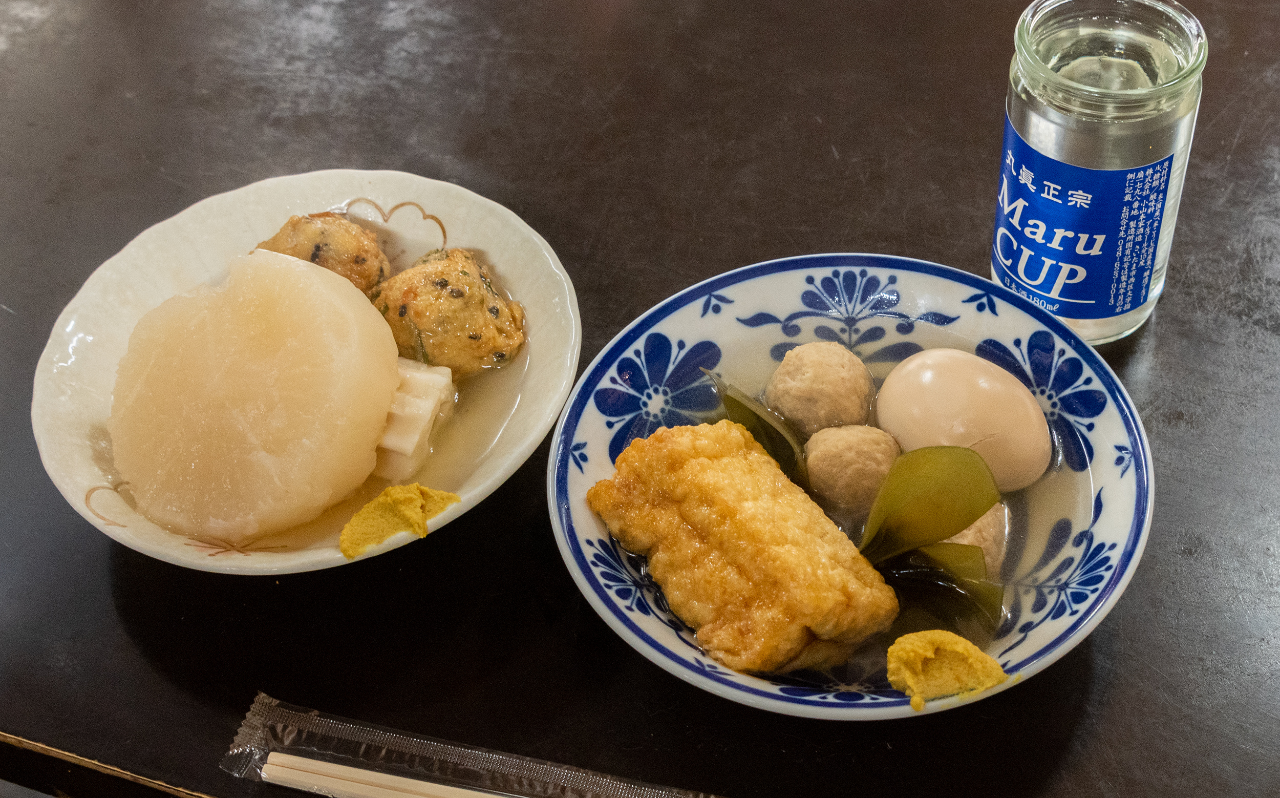 赤羽丸健水産の出汁割りと名物おでん！独自ルールと最新混雑ガイド